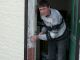 Scraping down the door frame
