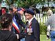 The Maire of Courseulles sur Mer with one of the veterans