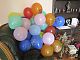 The youngsters were put in charge of blowing up balloons and sticking things on walls