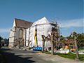 The repair work on the church continues